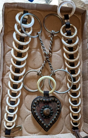 Upstairs, bring help. Horse bits and bridle pieces I think were for showing; longest piece measures