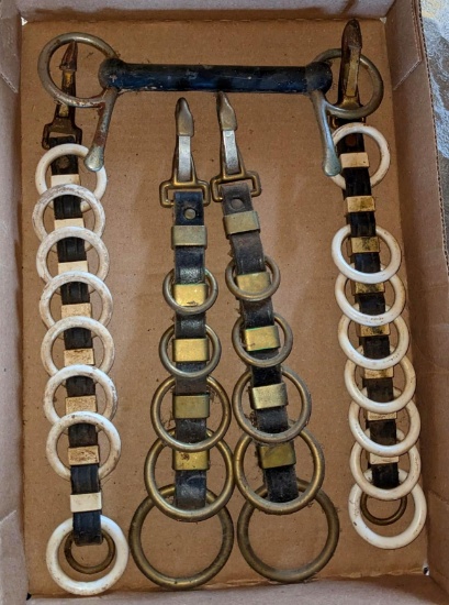 Upstairs, bring help. Horse bridle pieces and bit; longest piece is 12".