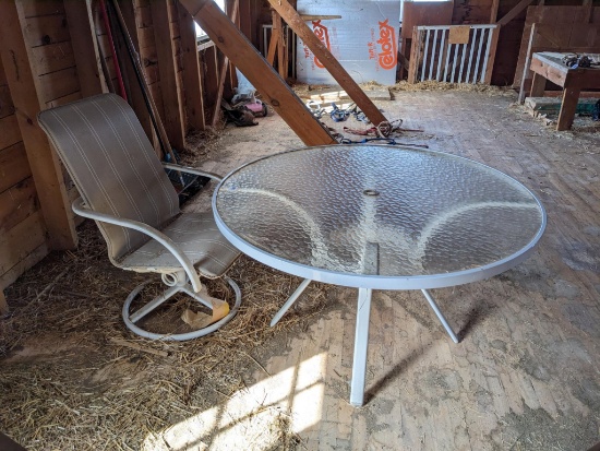 Upstairs, bring help. Picnic table and swiveling chair; table measures 4' across.