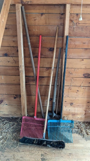 Upstairs, bring help. Stall rakes, shovel and broom.