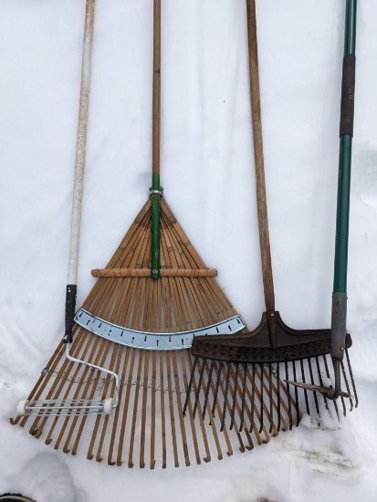 Leaf rakes, hoe, paint roller frame with handle is 6'.