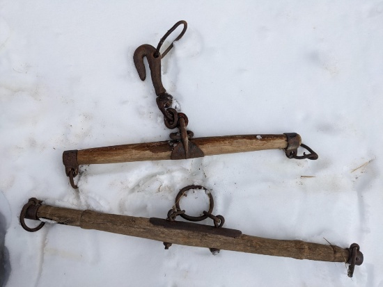 Two single trees with hooks, longer is 42" and has a 5" hoop.
