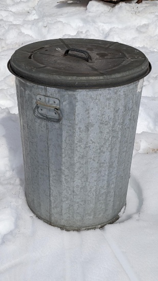 Galvanized garbage can would be great for birdseed or other, 24" high.