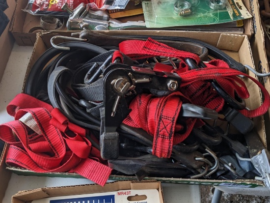 Three one inch ratchet straps and several bungie cords.
