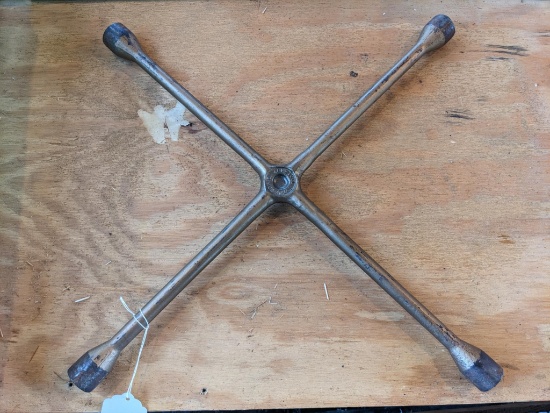 Ken Tool 4 way lug wrench that is in good condition.