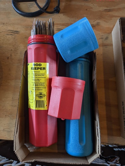 Two welding rod keepers, one has a hand full of 6013 and 6011 rods up to 3/16".