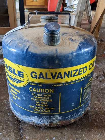 Eagle 5 gal. galvanized gas can in a classic blue color, will clean up nicely.