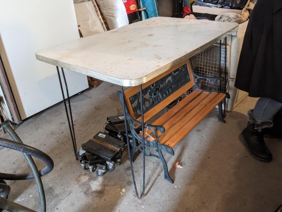 Vintage formica table with metal legs; measures 30" x 47" x 30" tall.