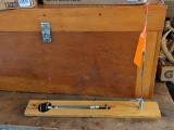 South bend ice fishing tip-up. The tip-up appears to be in good condition.