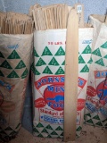 Johnson's mink food paper bag full of 3' long fur stretchers.