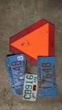 Pair of Wisconsin collector license plates, and Wisconsin motorcycle plate. Incl. plastic slow