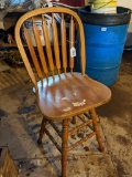 Swiveling stool is in overall good condition and measures 18