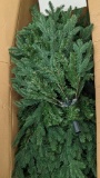 6-1/2' artificial Christmas tree from Stein's Garden Center comes with original box and looks in