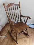 Nice rocking chair is in good condition and measures about 24