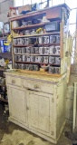 Really cool antique chipped paint hutch has been used in the garage, but will clean up nice. One
