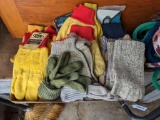 Several pair of men's work gloves, some new with tags, some rag wool fingerless gloves, more.