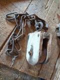 Upstairs, bring help. Old wooden hay pully; measures 5