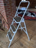 Upstairs, bring help. Step stool with 3 steps; measures 17