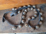 6' long leather belt w/ 28 steel sleigh bells, sounds very festive. Belt is missing two bells, but