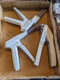Three Ethicon Proximate veterinary staplers.