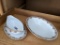 Limoges Florale pattern china bowl and gravy boat were made in France. Very small chipping noted on