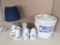 Cream and blue stoneware pieces, some marked Pfaltzgraff. Lamp and cookie jar are marked. Pieces in