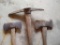Two double bit axes and a double sided pick axe. Larger double bit axe has a 36