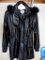 Women's Genuine Lambskin coat by Worthington has a dyed fox strip hood trim from Finland. Some