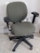 Nice rolling office chair in good condition has an adjustable back. Seat raises from 18