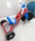 Big Wheel tricycle, made in the USA and looks fun. is 3' long