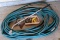 Shower wand hose attachment, several brass hose spouts, lawn sprinkler, and