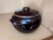 Glazed stoneware bean pot with lid is marked USA. In good condition, about 8