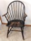 Windsor style chair is sturdy, but has one spindle detached and included.