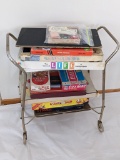 Vintage cart with games from back in the day including Life, Clue, Sorry and more. Will ship without