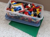 Shoebox sized tote filled with Lego's; tote measures 7-1/2