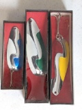 Three Kush spoons in original boxes; longest measures 4