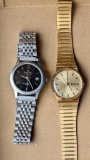 Timex Quartz date and time men's watch and a Berenger Steel date and time quartz men's watch. Both