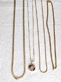 Four gold toned necklaces and chains up to 14