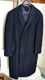 Nice quality men's coat was made by Hickey-Freeman and customized for Marshall Fields Co. Some tears