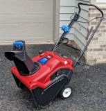 Toro Power Clear snowblower with a 141cc 2 stroke engine that fires right up and runs good and has a