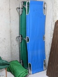 2 Sturdy camping cots and a sleeping bag for your next adventure. Cots are approx. 76