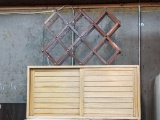 Wooden wine rack and sliding door cabinet. Wine rack is approx 16