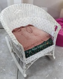 Wicker rocking chair would look great on your porch, measures approx 28