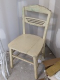 Cute vintage wooden chair is sturdy and about 18