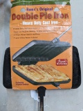 Rome's Original Double Pie Iron is cast iron w/ 22