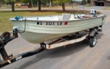 Mirro Craft 14' aluminum boat with 25 hp Evinrude outboard motor on a Spartan tiltable boat trailer.