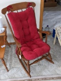 Sweet little rocking chair is marked Salem on the bottom. Comes with comfortable cushions and is in