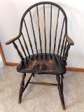 Windsor style chair is sturdy, but has one spindle detached and included.