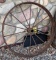 Steel implement wheel marches the other in lot 164. Measures about 41
