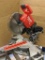 Milwaukee M18 Fuel brushless sliding compound miter saw with battery. Runs. Features light system,